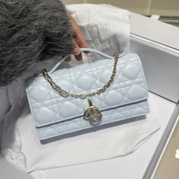 Dior Light Blue Quilted Mini Top Handle Bag with Pearl Chain image 1