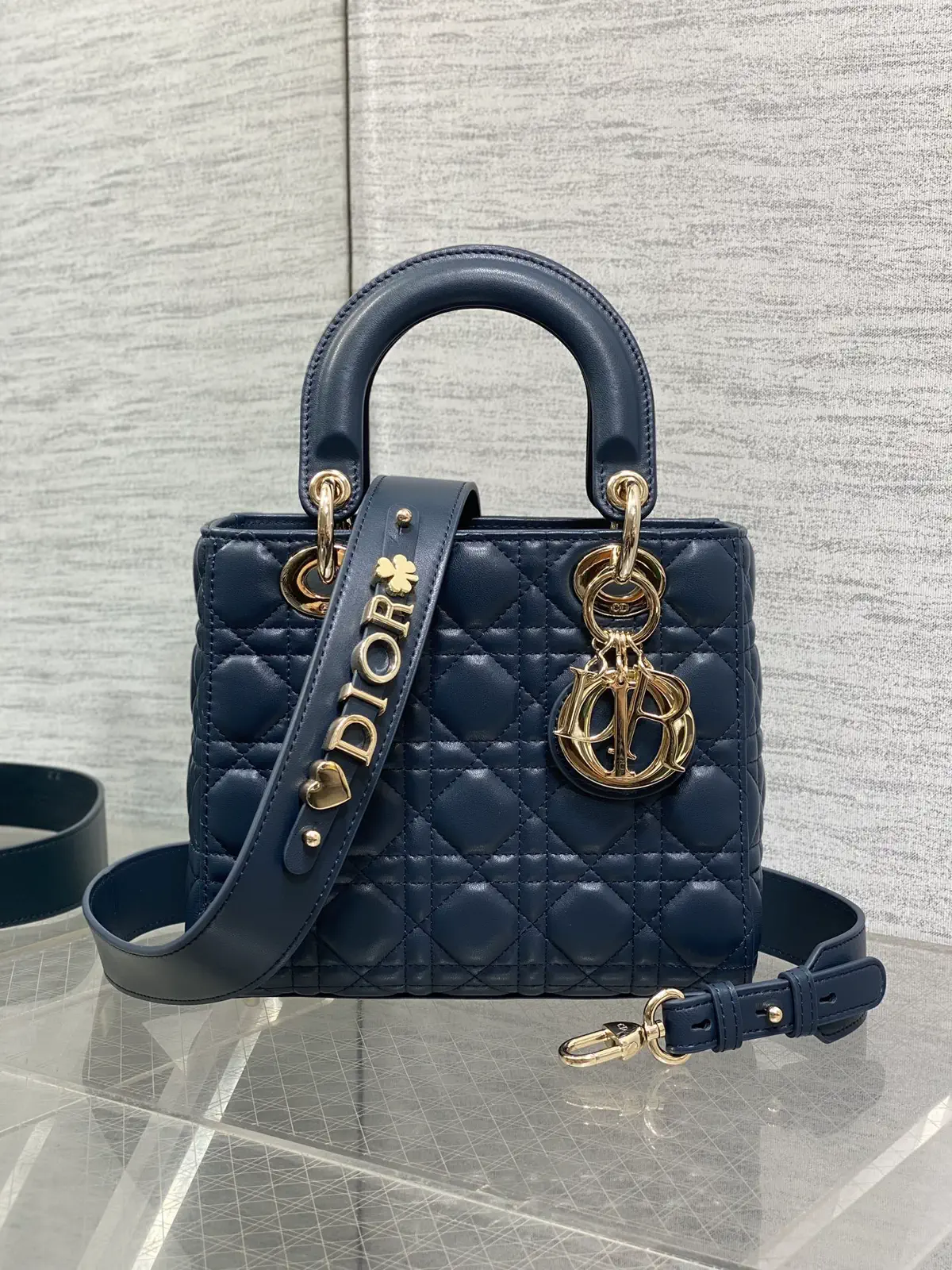 Dior Quilted Top Handle Bag with Decorative Shoulder Strap image 1