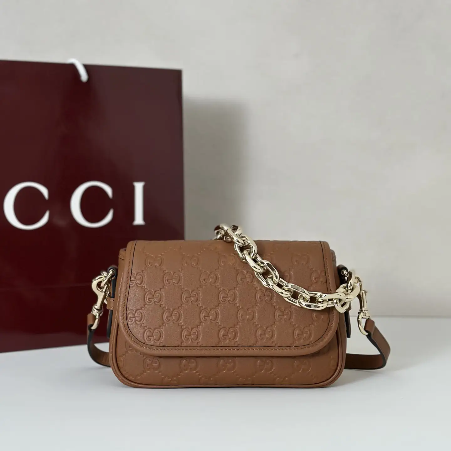 Gucci Monogram Embossed Crossbody Bag image 1