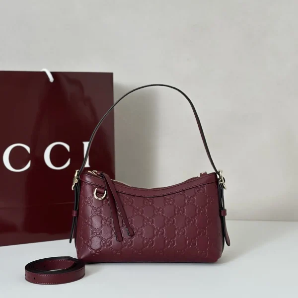 Gucci Embossed Monogram Shoulder Bag image 1