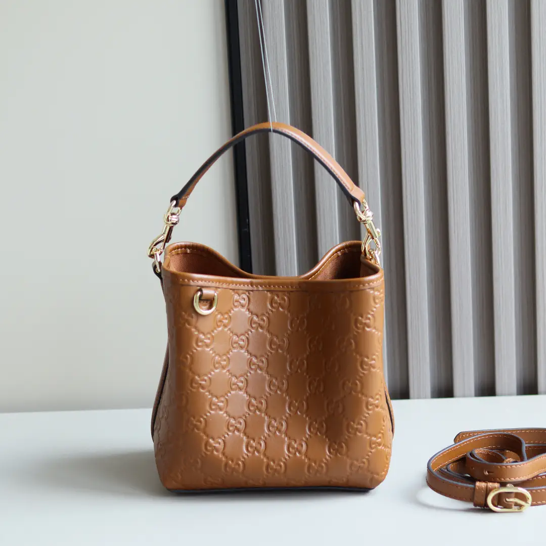 Gucci Embossed Monogram Bucket Bag image 1