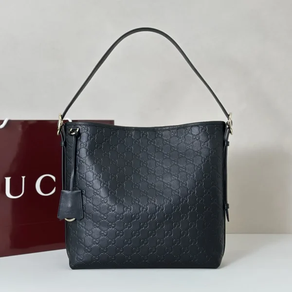 Gucci Embossed Monogram Shoulder Bag image 1