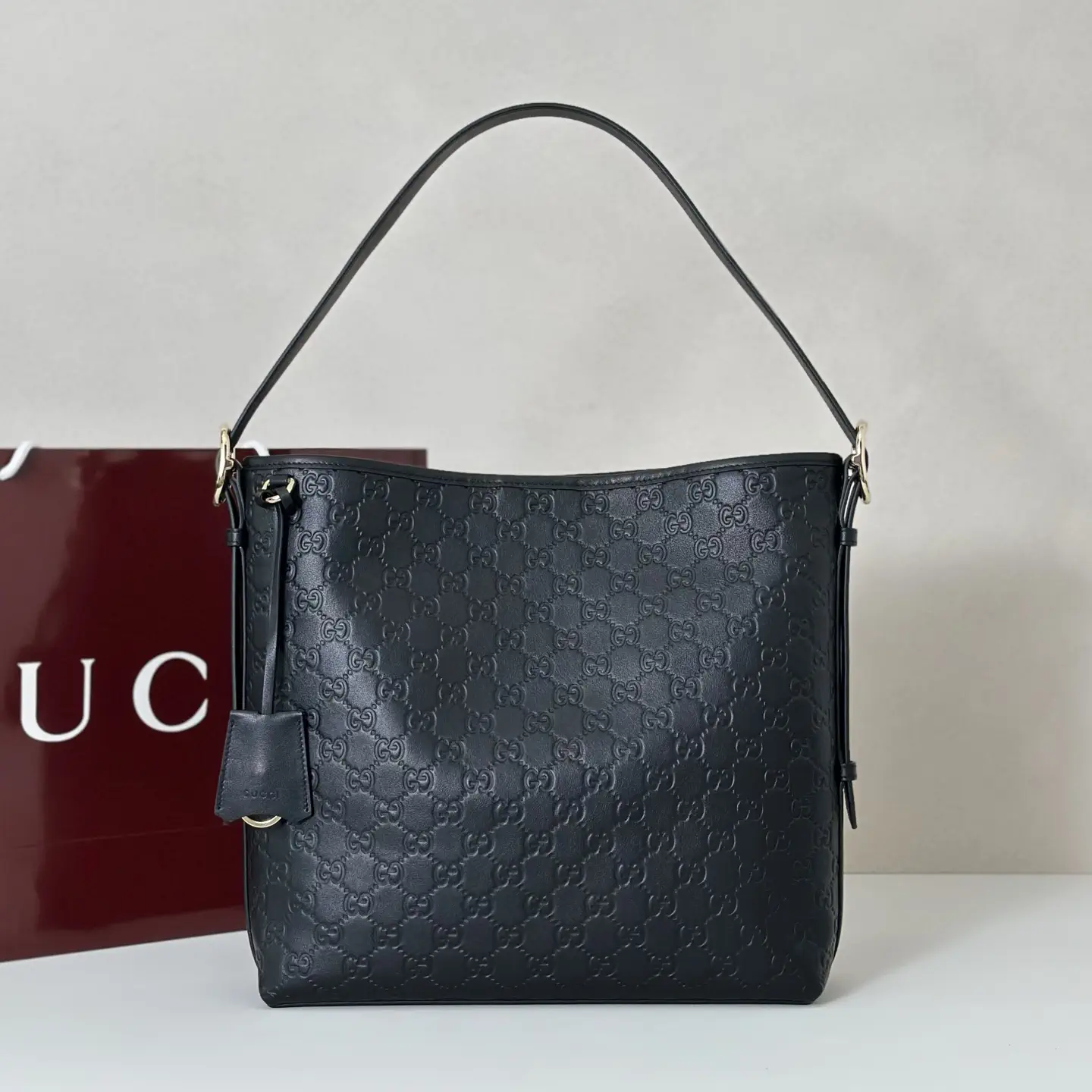 Gucci Embossed Monogram Shoulder Bag image 1