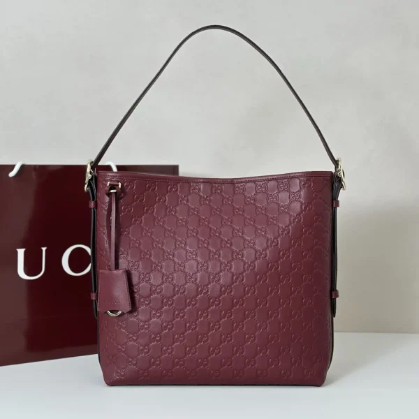 Gucci Embossed Monogram Shoulder Bag image 1