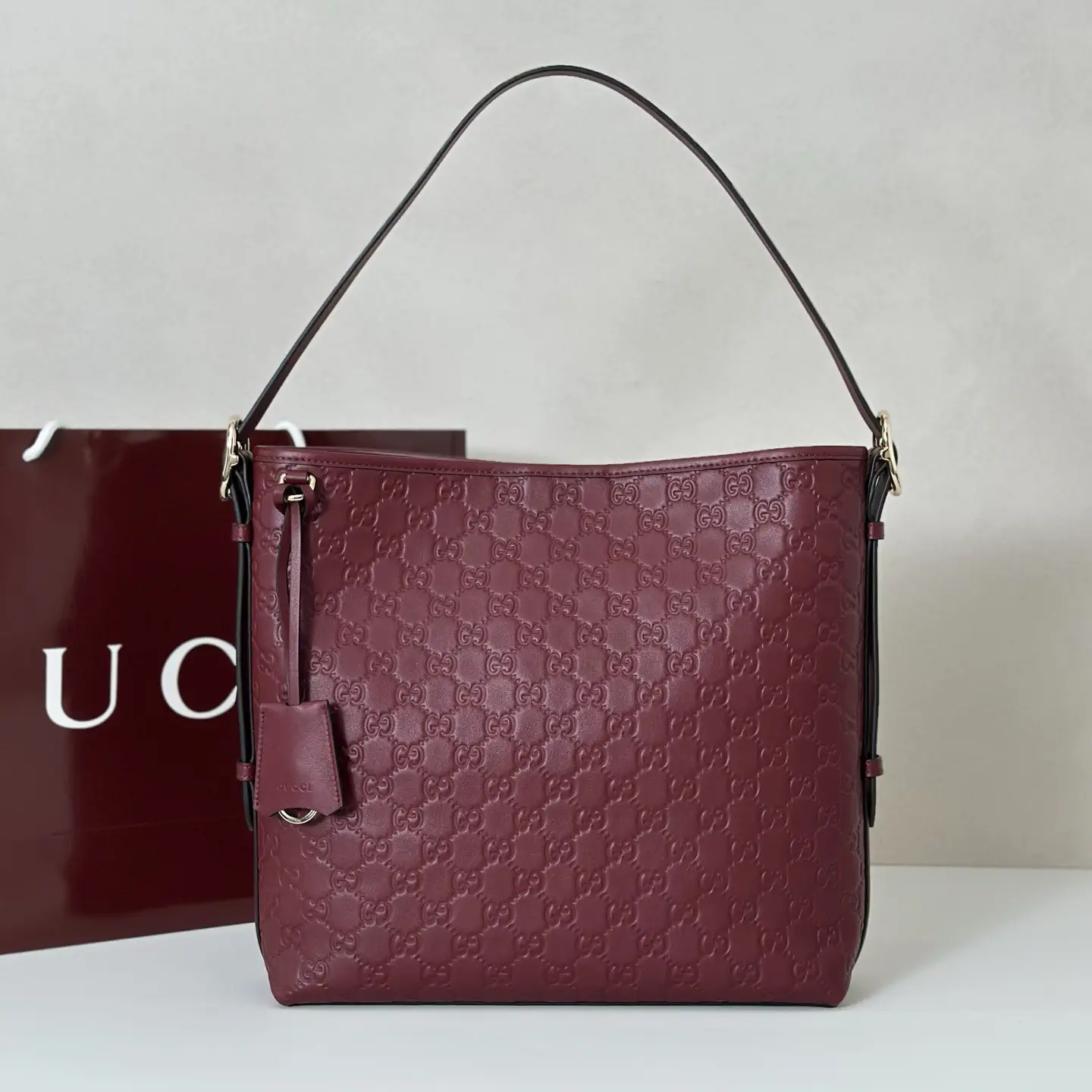 Gucci Embossed Monogram Shoulder Bag image 1