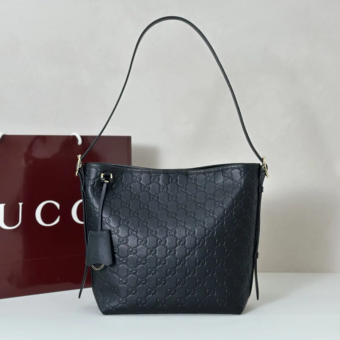 Gucci Embossed Monogram Shoulder Bag image 1