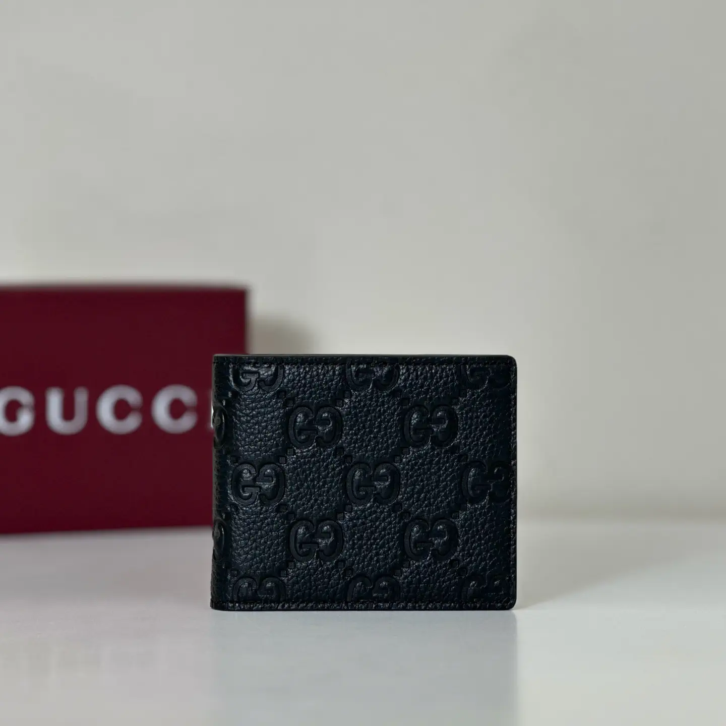 Gucci Embossed GG Bifold Wallet image 1