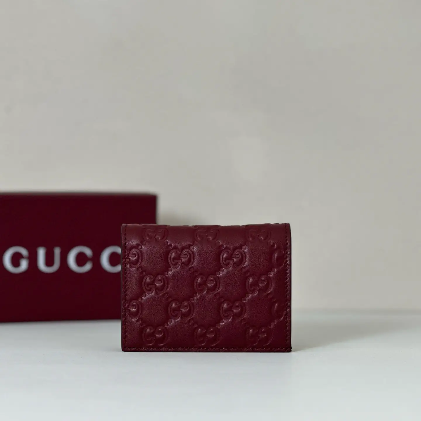 Gucci Burgundy Embossed GG Wallet image 1