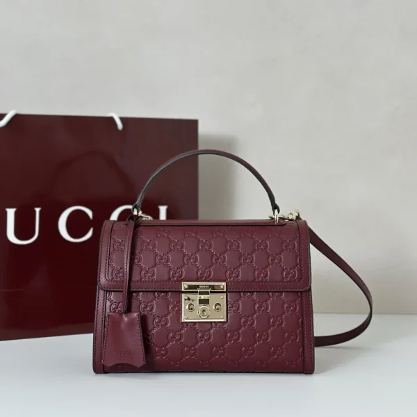 Gucci Embossed Monogram Top Handle Bag image 1