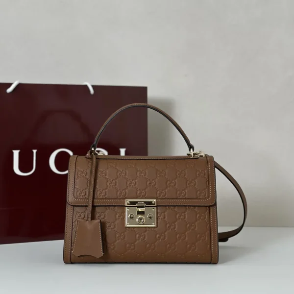 Gucci Monogram Embossed Top Handle Bag image 1