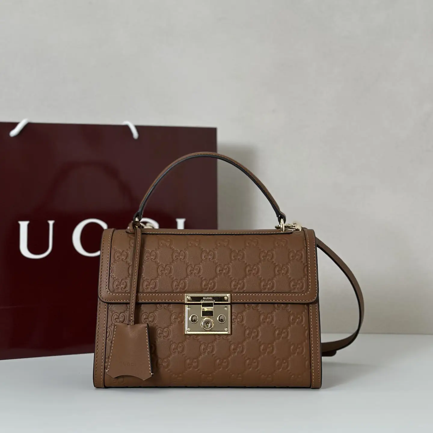 Gucci Monogram Embossed Top Handle Bag image 1