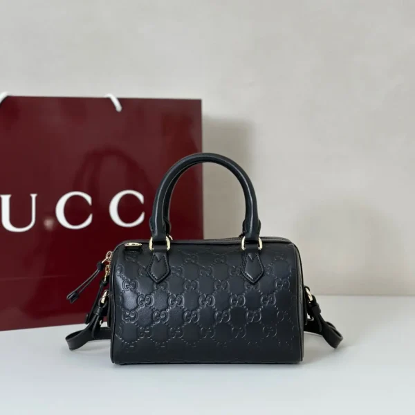 Gucci Embossed Monogram Top Handle Bag image 1
