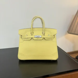 Hermès Top Handle Bag with Decorative Perforated Detailing image 1