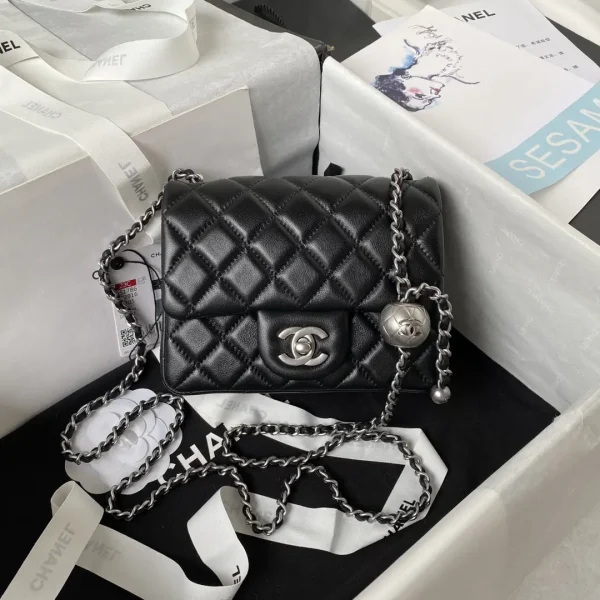 Chanel Black Quilted Mini Flap Bag with Adjustable Silver Chain image 1