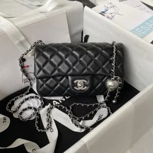 Chanel Black Quilted Flap Bag with Adjustable Silver Chain image 1