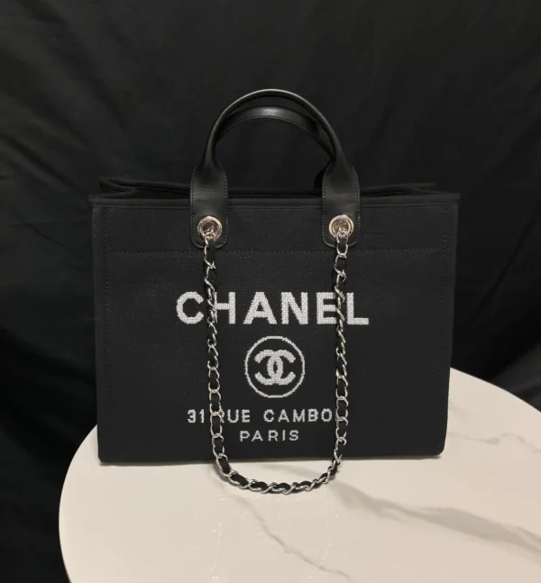 Chanel Black Tote Bag with White Logo Text image 1