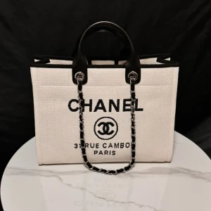 Chanel White Tote Bag with Black Logo and Chain Straps image 1