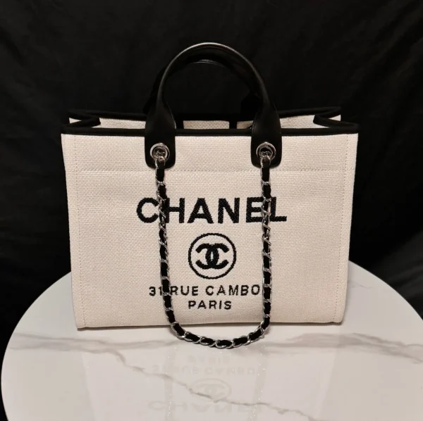Chanel White Tote Bag with Black Logo and Chain Straps image 1