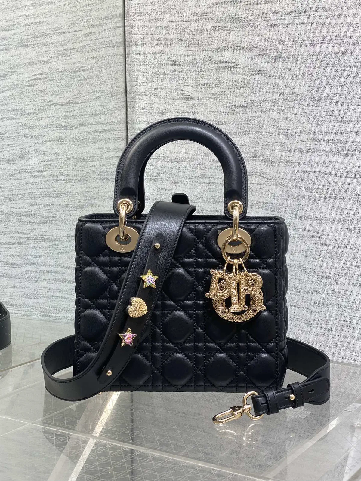 Dior Quilted Top Handle Bag with Decorative Strap image 1