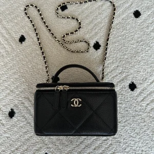 Chanel Black Quilted Vanity Case with Chain Strap image 1