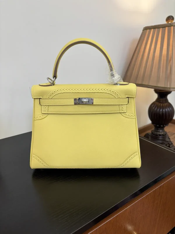 Hermès Kelly Top Handle Bag with Lace Embossed Detail image 1