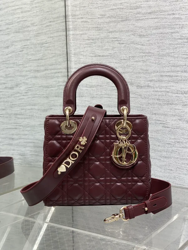 Dior Quilted Top Handle Bag with Decorative Shoulder Strap image 1