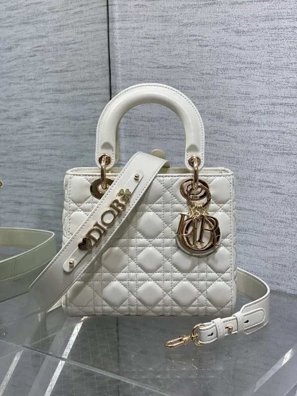 Dior White Quilted Top Handle Bag with Decorative Shoulder Strap image 1