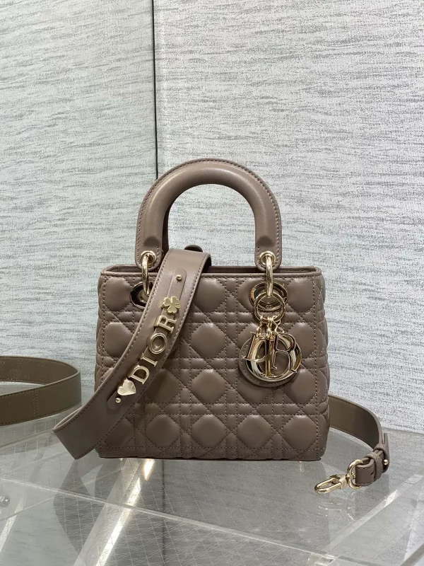 Dior Quilted Top Handle Bag with Decorative Shoulder Strap image 1