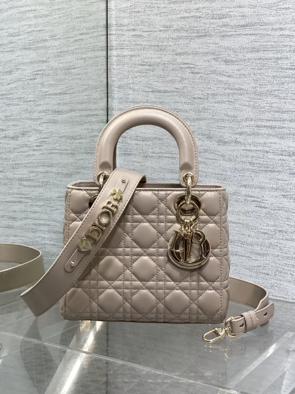 Dior Quilted Top Handle Bag with Decorative Shoulder Strap image 1