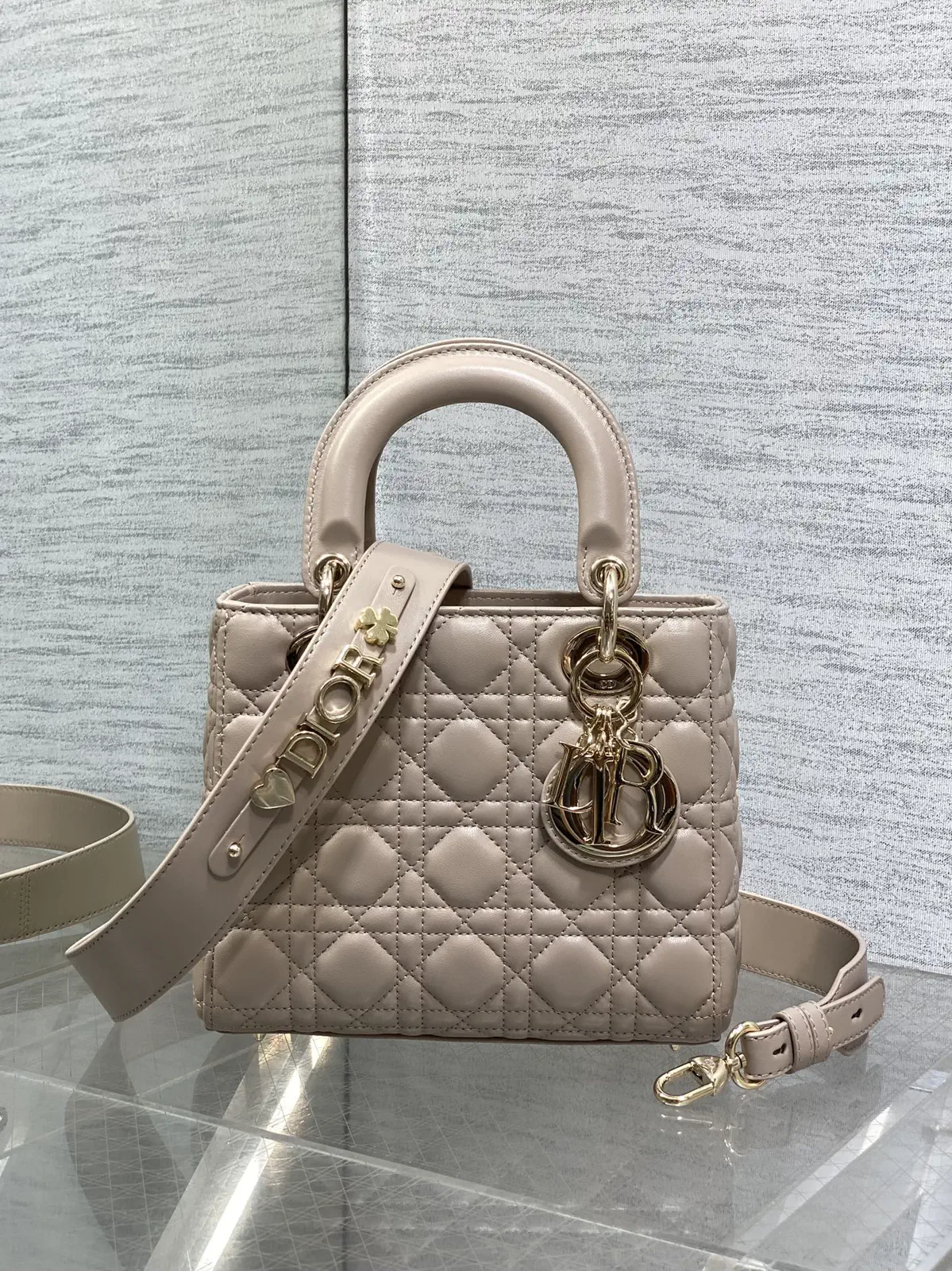 Dior Quilted Top Handle Bag with Decorative Shoulder Strap image 1
