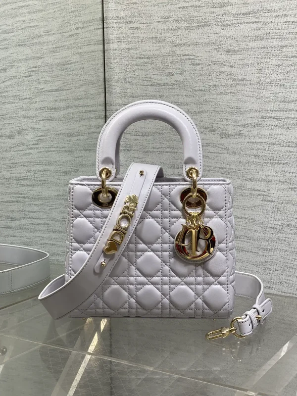 Dior Quilted Top Handle Bag with Decorative Shoulder Strap image 1