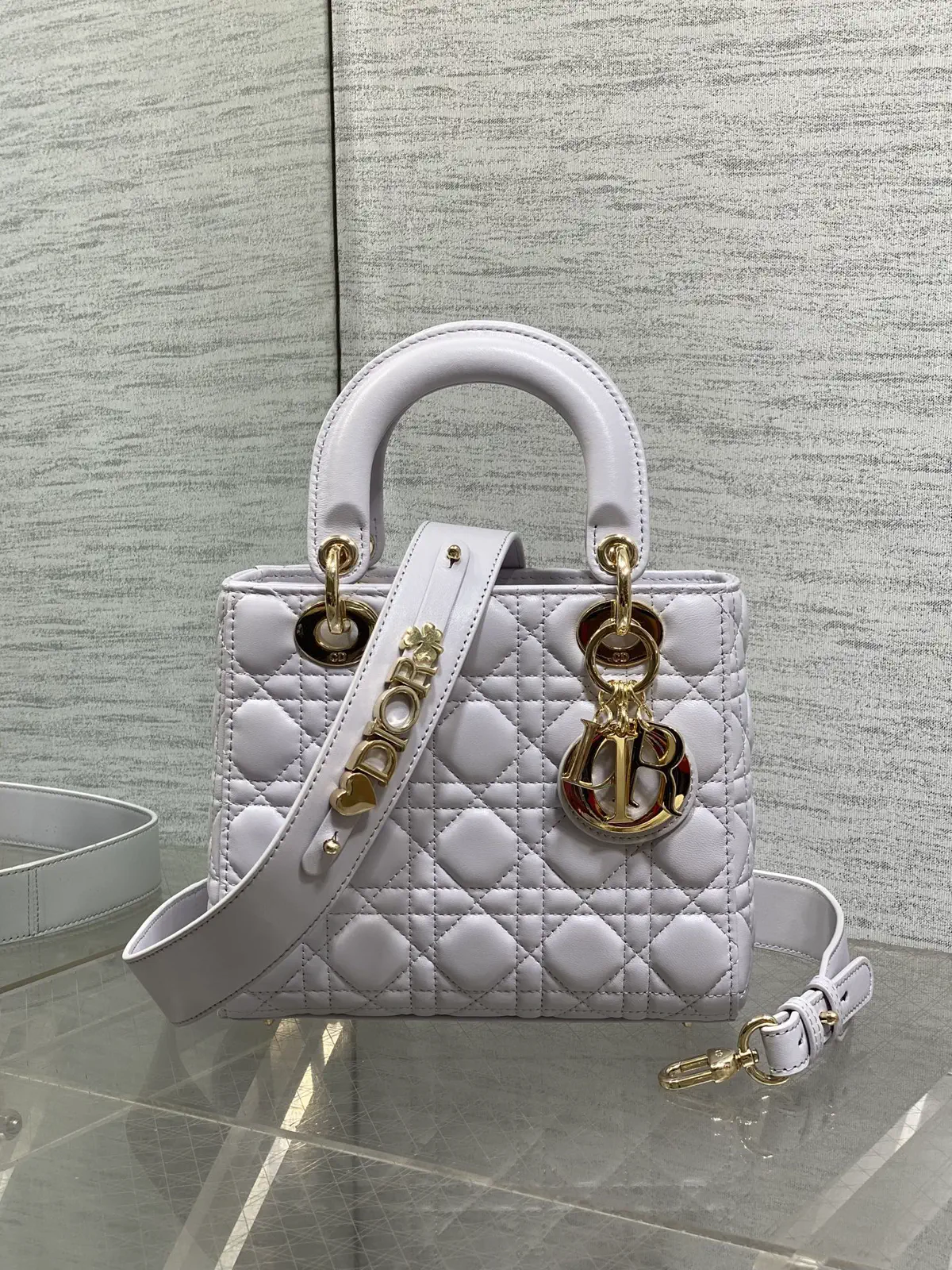Dior Quilted Top Handle Bag with Decorative Shoulder Strap image 1