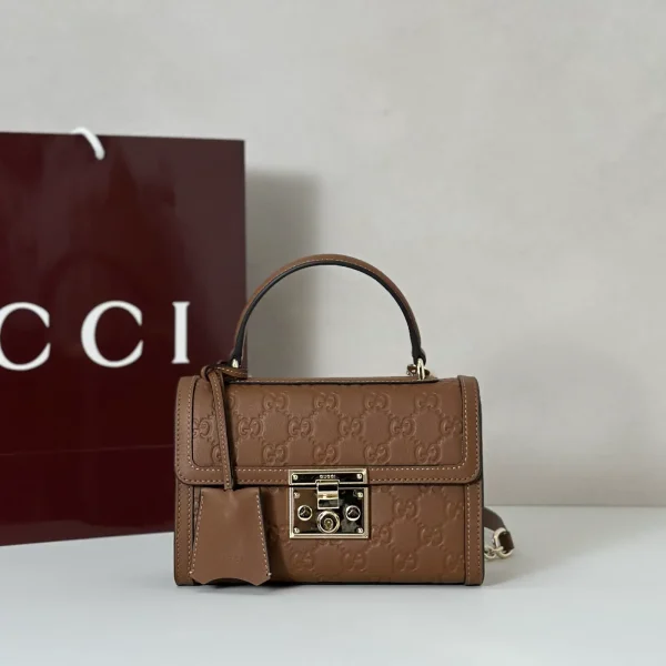Gucci Embossed Monogram Top Handle Bag image 1