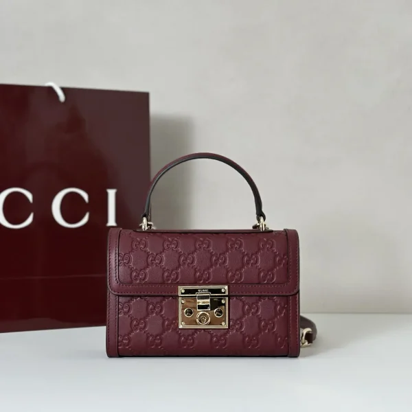 Gucci Monogram Embossed Top Handle Bag image 1