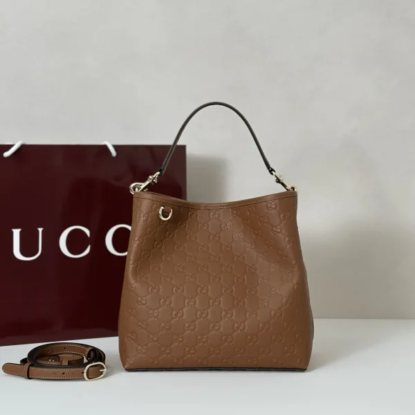 Gucci Embossed Monogram Bucket Bag image 1