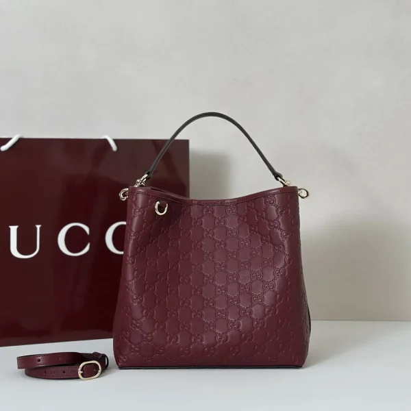 Gucci Embossed Monogram Top Handle Bag image 1