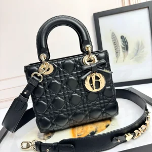 Dior Black Quilted Mini Top Handle Bag with Bow Charm image 1