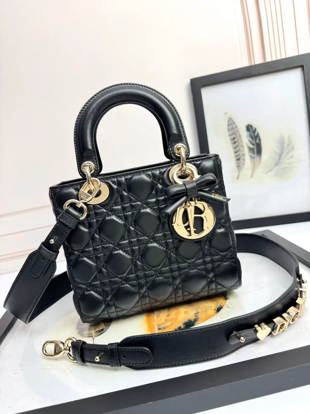 Dior Black Quilted Mini Top Handle Bag with Bow Charm image 1