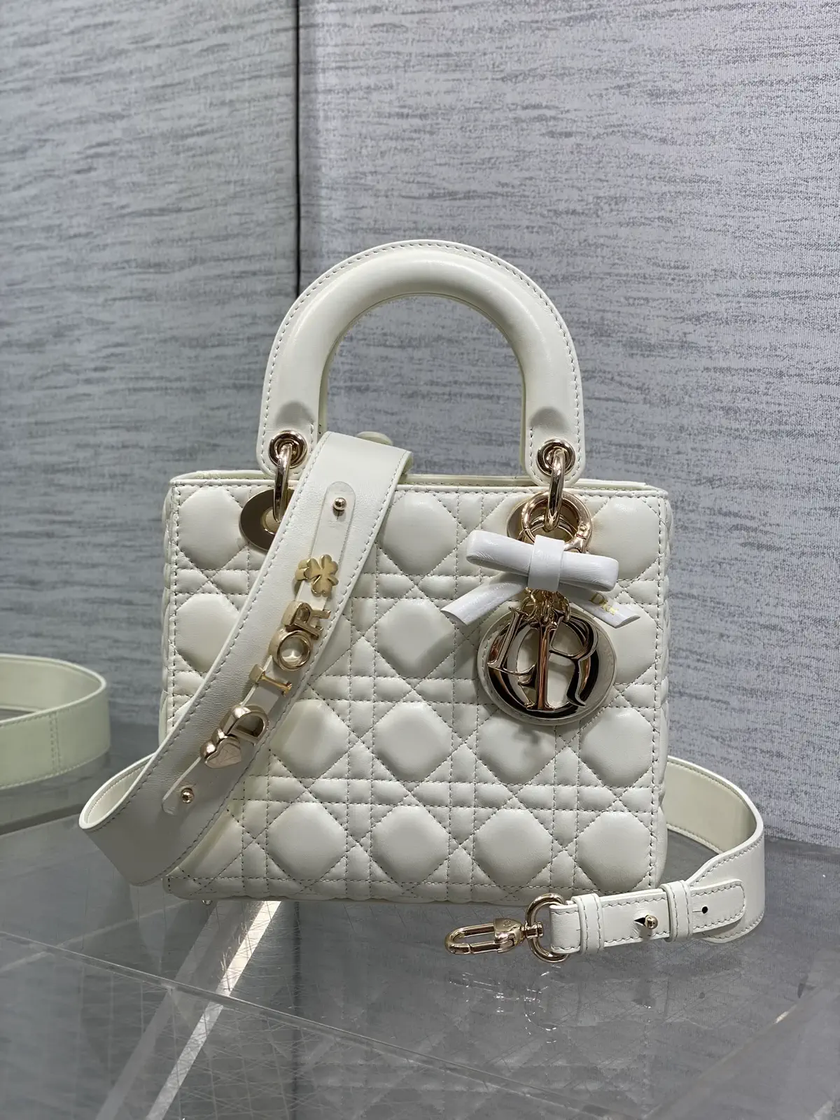 Dior White Quilted Top Handle Bag with Bow Charm image 1