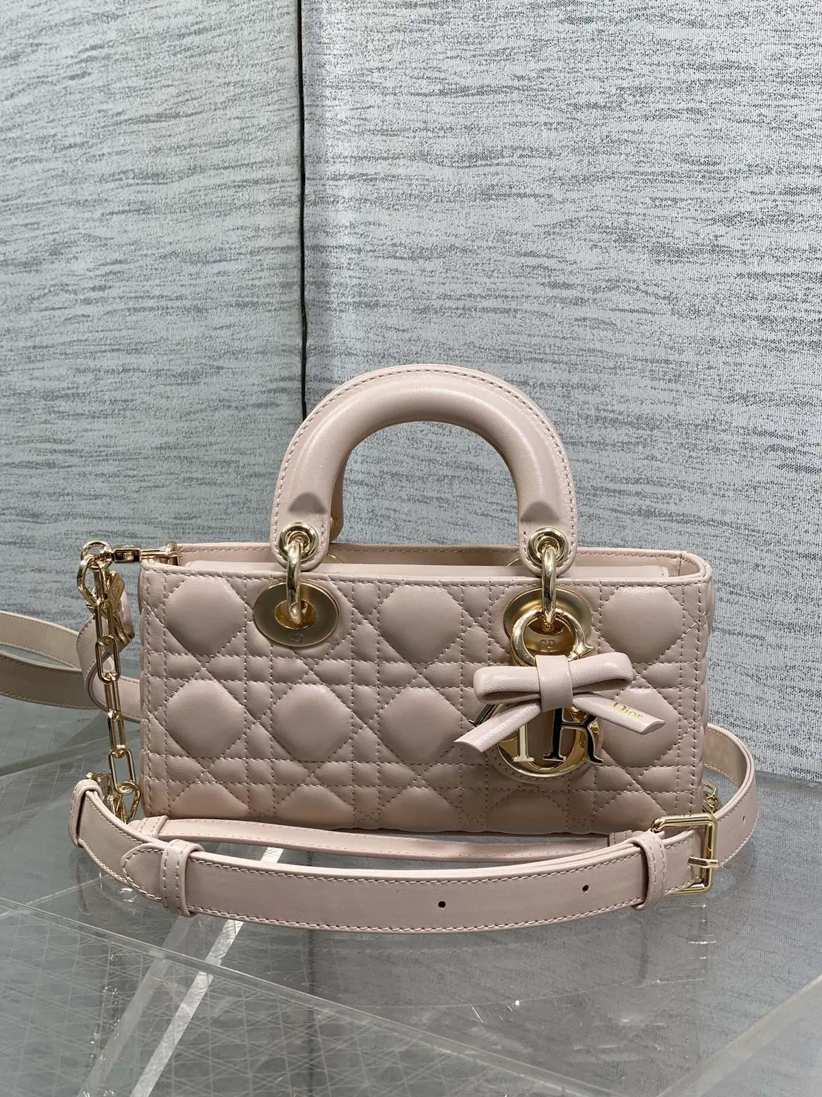 Dior Quilted Top Handle Bag with Bow Hardware image 1