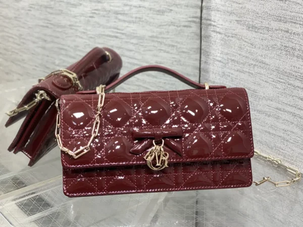 Dior Quilted Patent Clutch with Bow and Chain Strap image 1