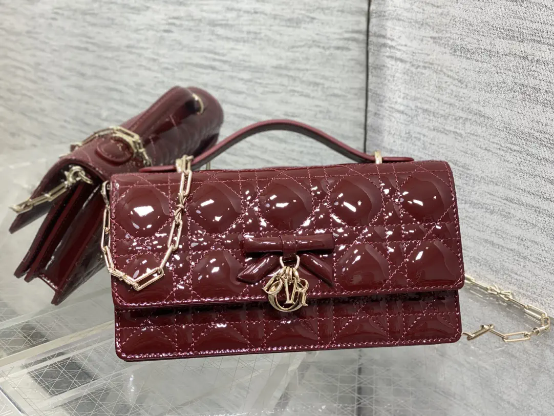 Dior Quilted Patent Clutch with Bow and Chain Strap image 1