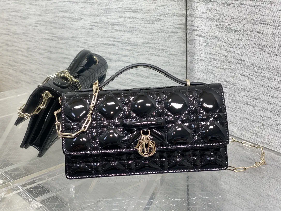 Dior Quilted Top Handle Bag with Bow Charm and Chain Strap image 1