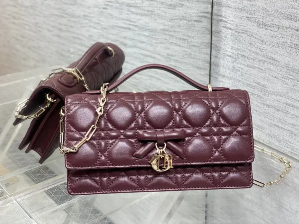 Dior Burgundy Quilted Top Handle Bag with Bow Charm image 1