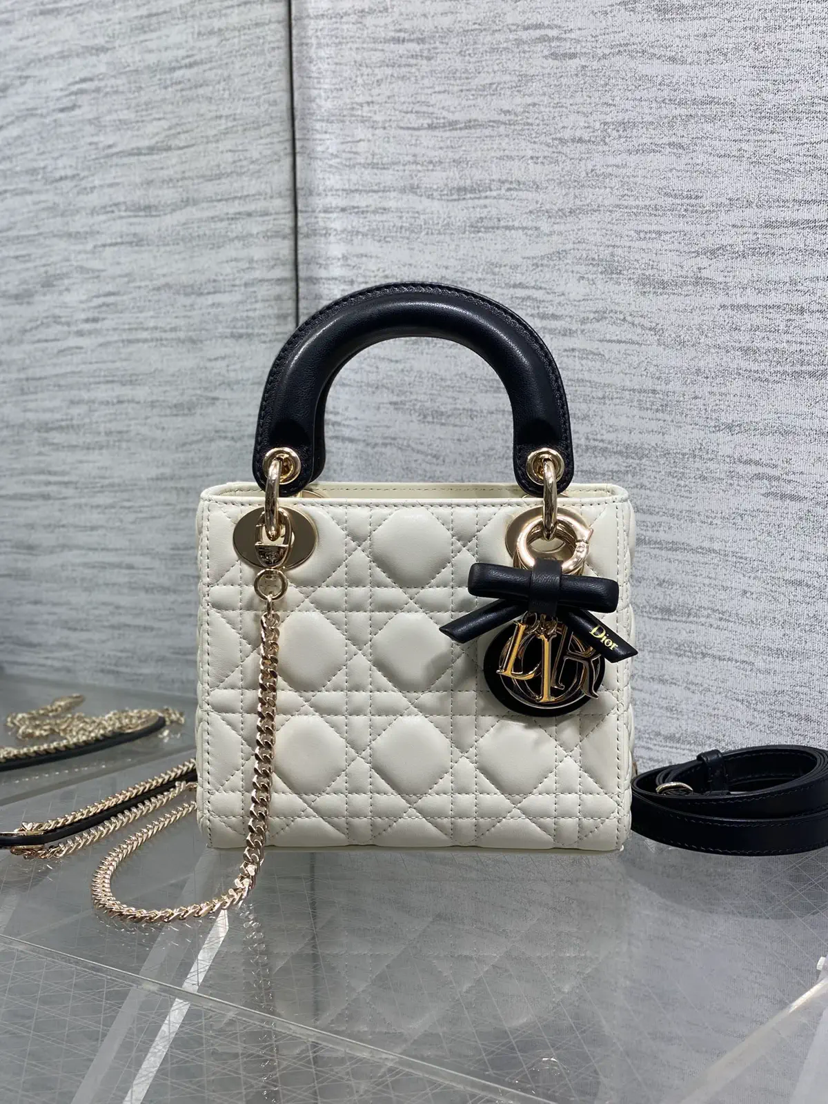 Dior Quilted Top Handle Bag with Bow Charm image 1