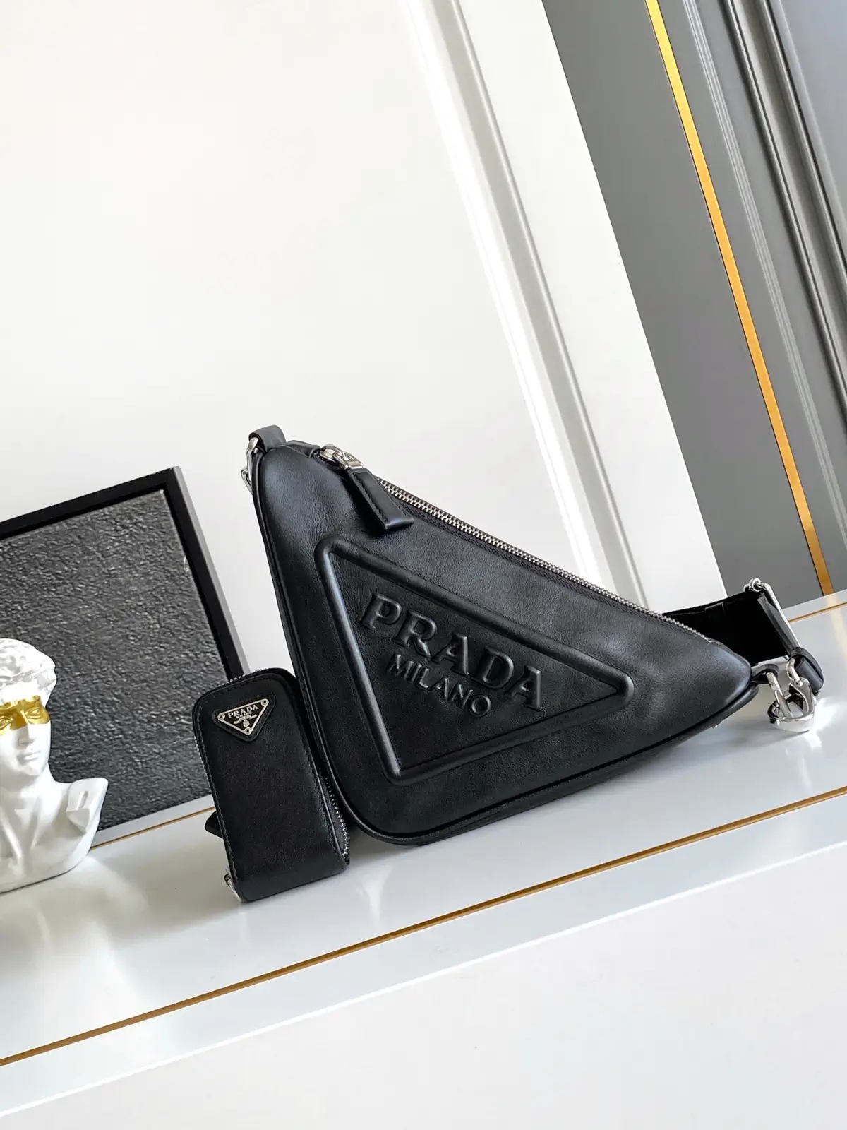 Prada Embossed Logo Triangle Crossbody Bag image 1