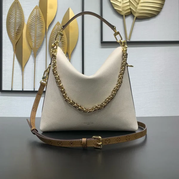 Louis Vuitton Cream Hobo Bag with Monogram Trim and Chain Detail image 1