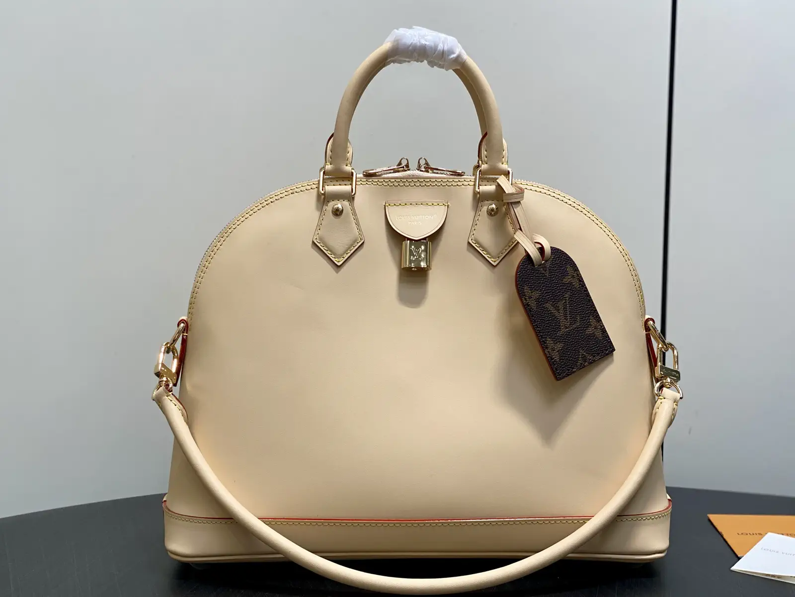 Louis Vuitton Cream Alma Top Handle Bag image 1