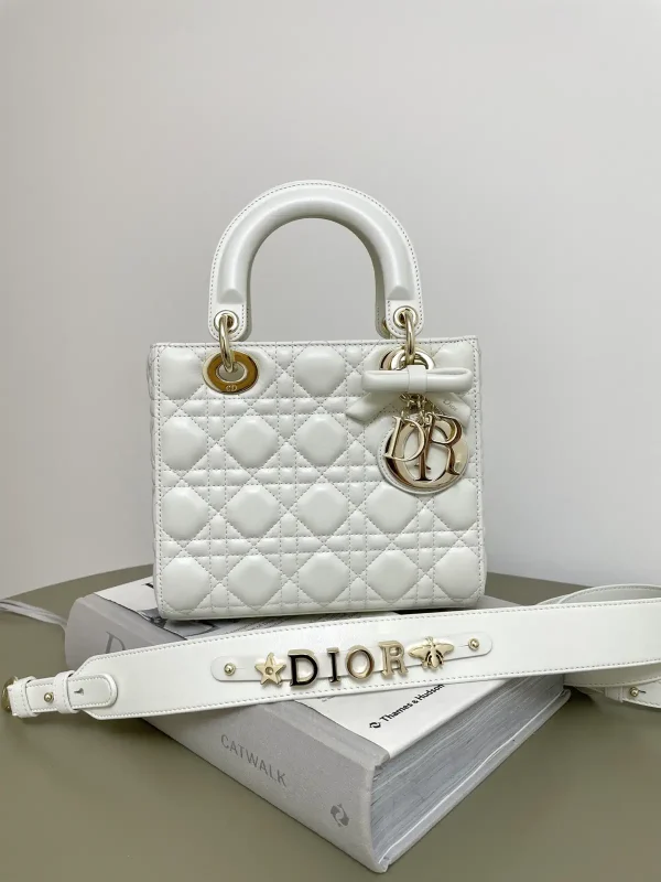 Dior White Quilted Top Handle Bag with Bow Charm and Letter Shoulder Strap image 1