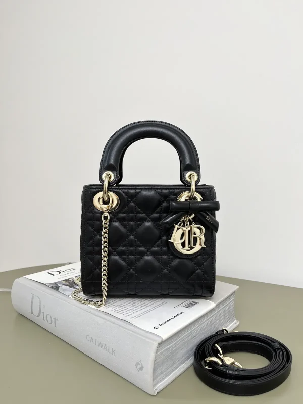 Dior Black Quilted Top Handle Bag with Bow Charm image 1